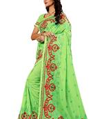Light green embroidered silk saree with blouse