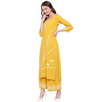 Yellow printed rayon kurtas-and-kurtis 3