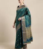Sea green woven raw silk saree with blouse