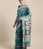 Turquoise woven raw silk saree with blouse