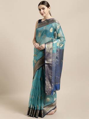 Turquoise woven organza saree with blouse 1