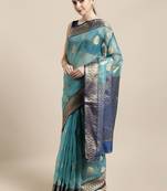 Turquoise woven organza saree with blouse