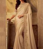 Beige embroidered satin saree with blouse