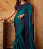Blue embroidered satin saree with blouse
