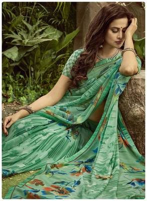 green printed georgette saree with blouse 2