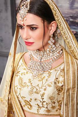 White embroidered silk semi-stitched lehenga 4