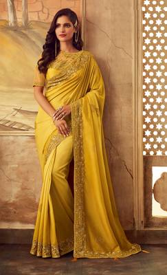 Yellow embroidered satin saree with blouse 1