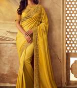 Yellow embroidered satin saree with blouse