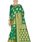 Green woven banarasi silk saree with blouse