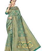 Green woven banarasi silk saree with blouse