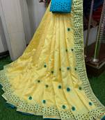 yellow art silk pompom saree with blouse