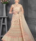 Beige Embroidered Net Semi Stitched Lehenga