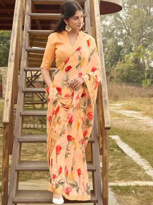 Light orange printed georgette saree with blouse 1