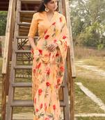 Light orange printed georgette saree with blouse