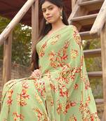 Green printed georgette saree with blouse