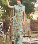Light green printed georgette saree with blouse