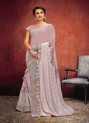   light pink printed lycra saree with blouse 1