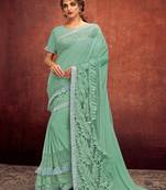   sea green embroidered lycra saree with blouse