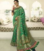 Green Embroidered Banarasi Silk Saree With Blouse