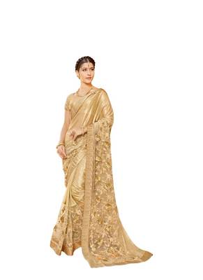 Golden embroidered lycra saree with blouse 1