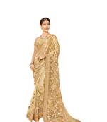 Golden embroidered lycra saree with blouse