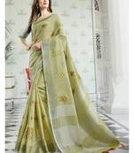 Light green embroidered linen saree with blouse