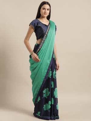 Turquoise printed georgette saree with blouse 1