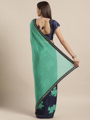 Turquoise printed georgette saree with blouse 2