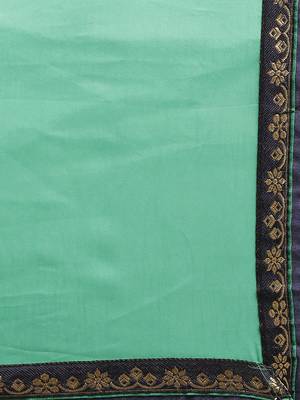 Turquoise printed georgette saree with blouse 4