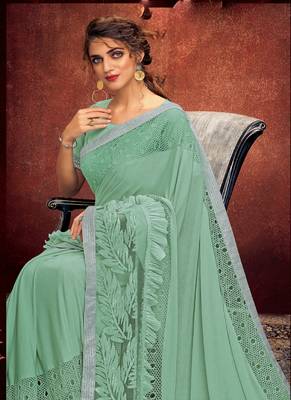   sea green embroidered lycra saree with blouse 2