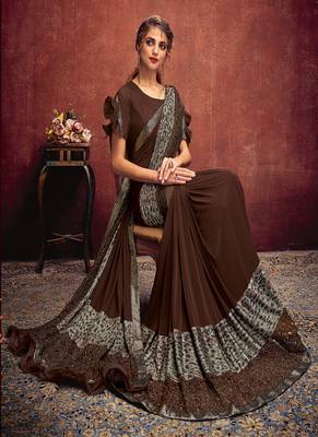 Brown embroidered lycra saree with blouse 2