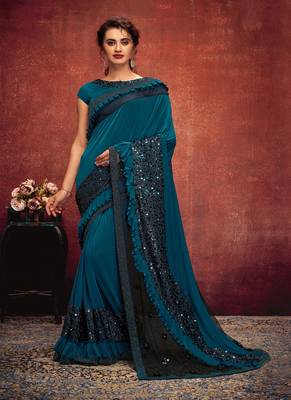 Teal embroidered lycra saree with blouse 1