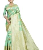 Green woven banarasi silk saree with blouse