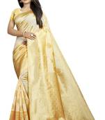 Beige woven banarasi silk saree with blouse
