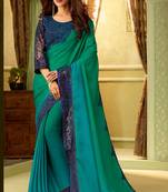 Green embroidered satin saree with blouse