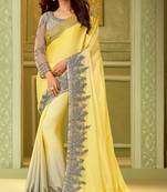 Yellow embroidered satin saree with blouse