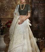 Off White Thread And Sequins Embroidered Organza Semi Stitched Lehenga