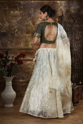 Off White Thread And Sequins Embroidered Organza Semi Stitched Lehenga 2