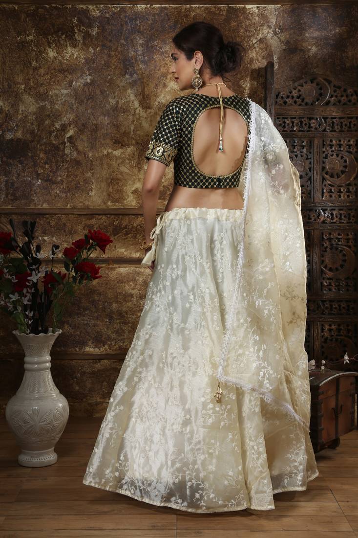 Off White Thread And Sequins Embroidered Organza Semi Stitched Lehenga