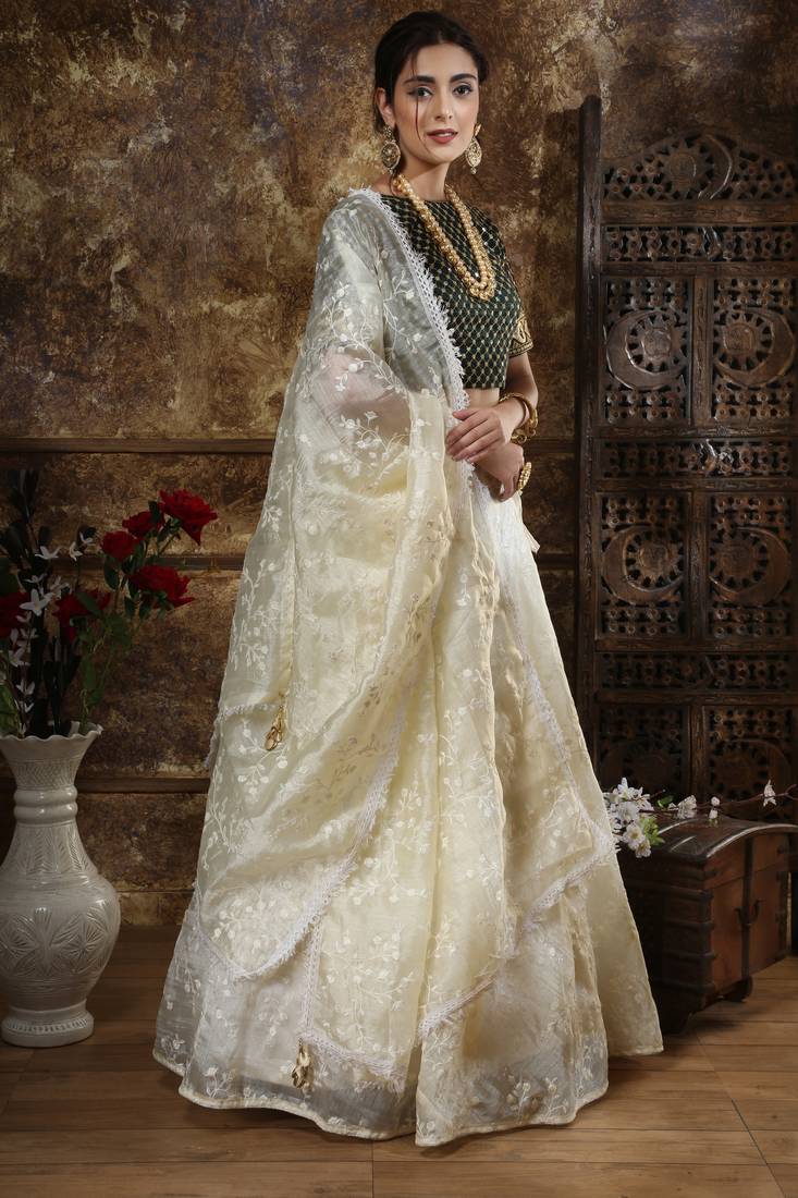 Off White Thread And Sequins Embroidered Organza Semi Stitched Lehenga