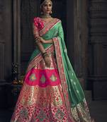 Rani-Pink Embroidered Silk Semi Stitched Lehenga