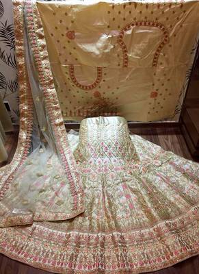 Cream Embroidered Satin Semi Stitched Lehenga 1