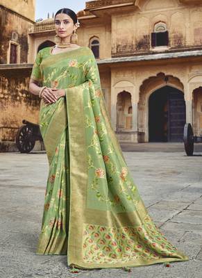 light green woven silk blend saree with blouse 1