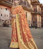 Orange woven silk blend saree with blouse