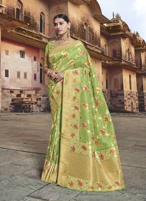   light green woven silk blend saree with blouse 1