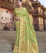   light green woven silk blend saree with blouse