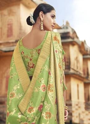   light green woven silk blend saree with blouse 2