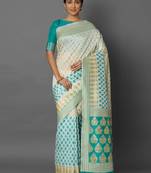 Off white woven cotton silk saree with blouse