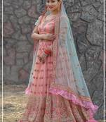 Pink embroidered net semi stitched lehenga