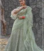 Green embroidered net semi stitched lehenga